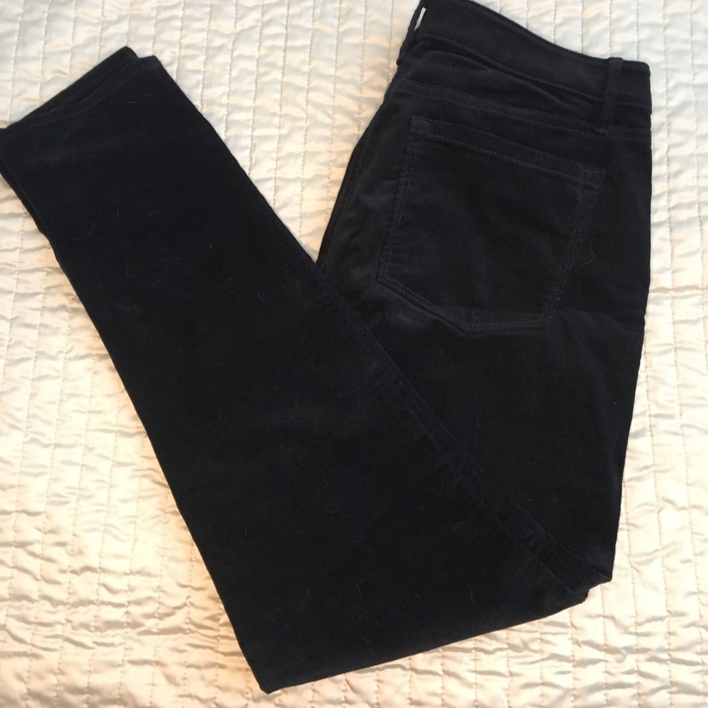 Like new. Never worn dark navy cords.